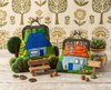 Kisslock coin purses decorated with quaint cottages showing the two sides of the quarter-acre block purse