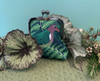 kisslock coin purse featuring an emerald ground dove
