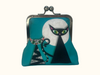 A large kisslock coin purse featuring stylised black, grey and white cats against a full moon on a turquoise background