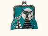 A large kisslock coin purse featuring stylised black, grey and white cats against a full moon on a turquoise background