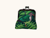 large kisslock coin purse with an emerald ground dove against a background of ferns