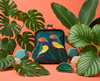 Large kisslock coin purse featuring two stylised Gouldian finches