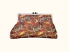 kisslock clutch purse with a goanna pattern in browns, beige and gold