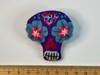 Hand-stitched felt sugar skull brooch in purple, blue and pink