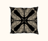 cushion with beige pattern of Atlas moth  on a black background