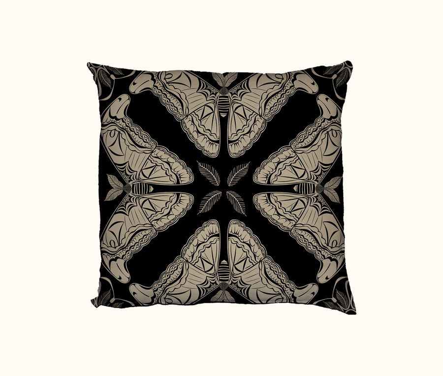 cushion with beige pattern of Atlas moth  on a black background
