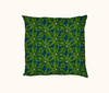 cushion with a pattern of fig leaves and clusters of small yellow fruit on a blue painterly background