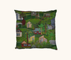 cushion with tropical houses and trees against a green background