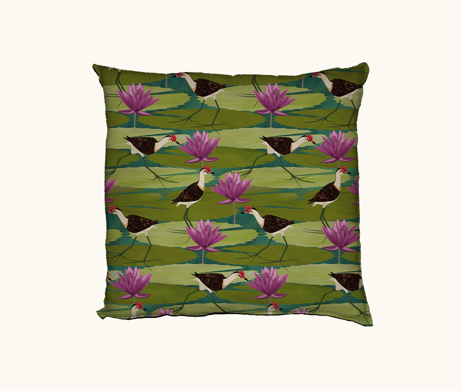 cushion with pattern of comb-crested jacanas and sacred lotus on water