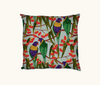Cushion featuring rainbow lorikeets in a gum tree on a very pale bllue background