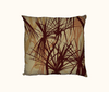 cushion with pandanus pattern in browns and terracotta tones