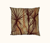 cushion with pandanus pattern in browns and terracotta tones