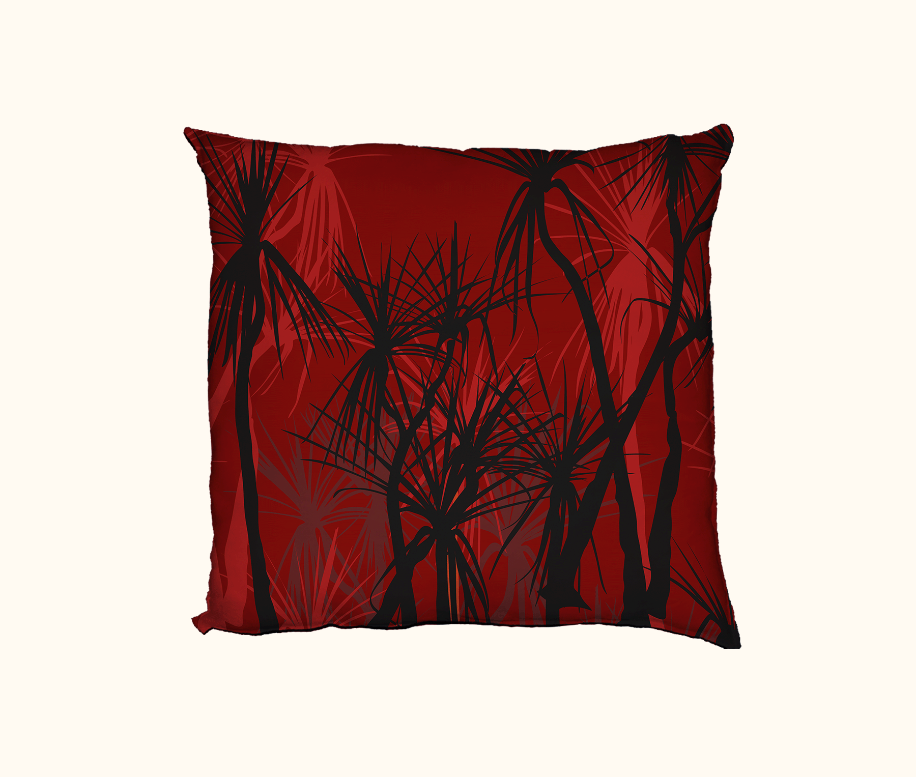 cushion with pattern of black pandanus on a red layered background