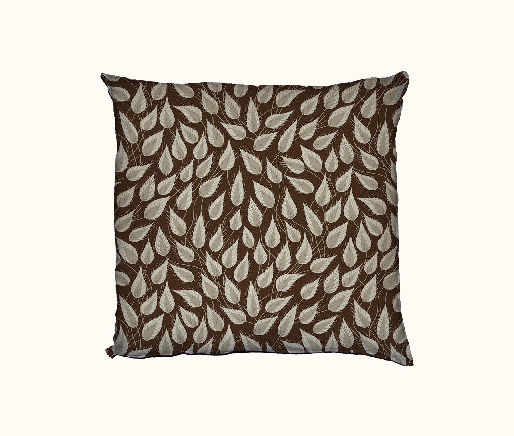 cushion patterned with stylised tufted grass heads against a brown spotted background
