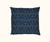 cushion patterned with highly stylised quolls in rows against a blue background