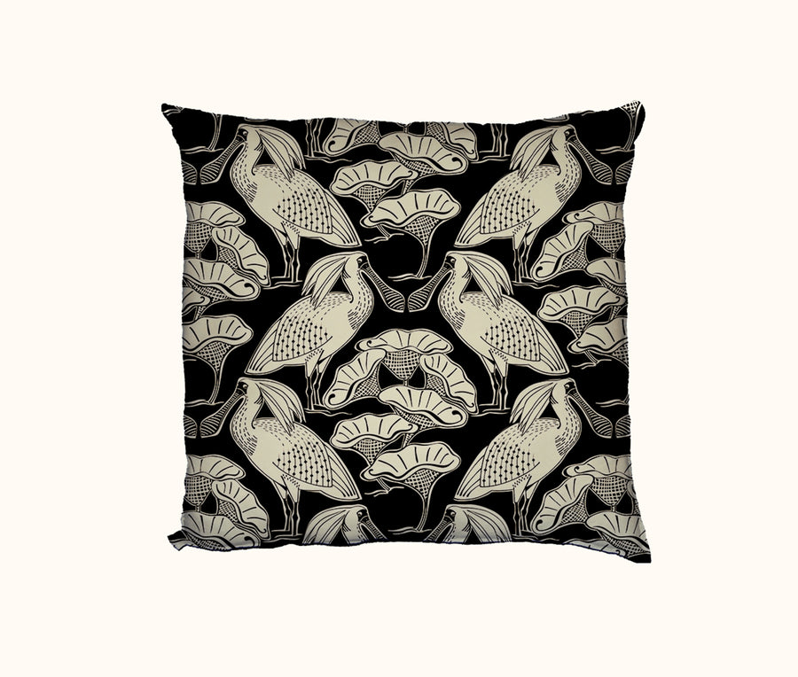 Cushion cover featuring black and cream pattern of royal spoonbills and sacred lotus leaves