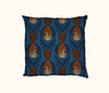 cushion featuring highly stylised silver-crowned friarbirds on a blue leaf-like pattern
