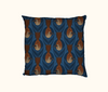 cushion featuring highly stylised silver-crowned friarbirds on a blue leaf-like pattern