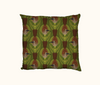 cushion featuring highly stylised silver-crowned friarbirds on a green leaf-like pattern