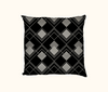 cushion with black and grey diamond pattern