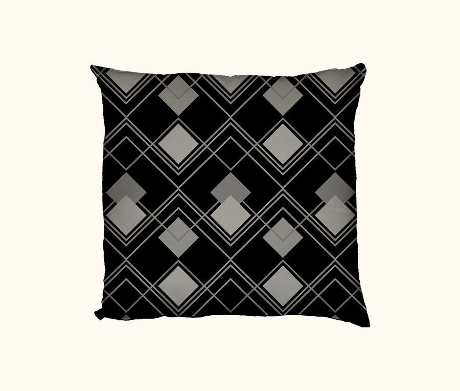 cushion with black and grey diamond pattern