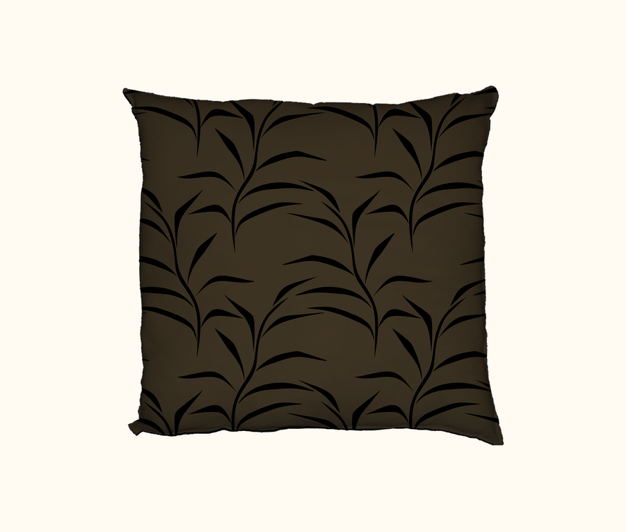Brown cushion cover with a simple black leaf design