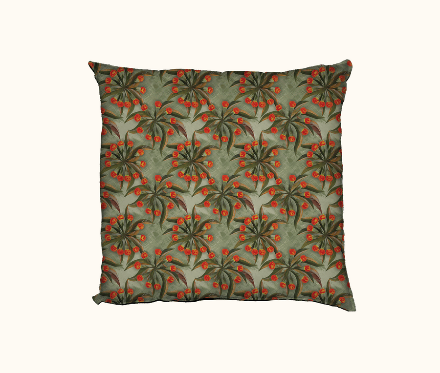 cushion with a woollybutt blossom pattern on sage green painterly backgroun