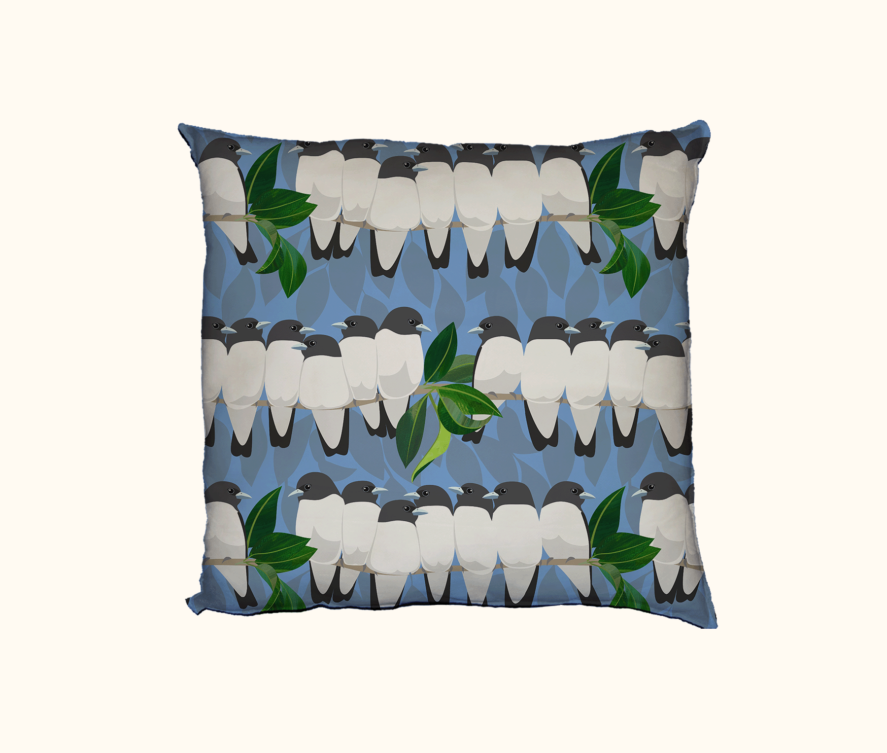 cushion with rows of white-breasted woodswallows on branches against a blue background of falling leaves