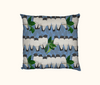 cushion with rows of white-breasted woodswallows on branches against a blue background of falling leaves