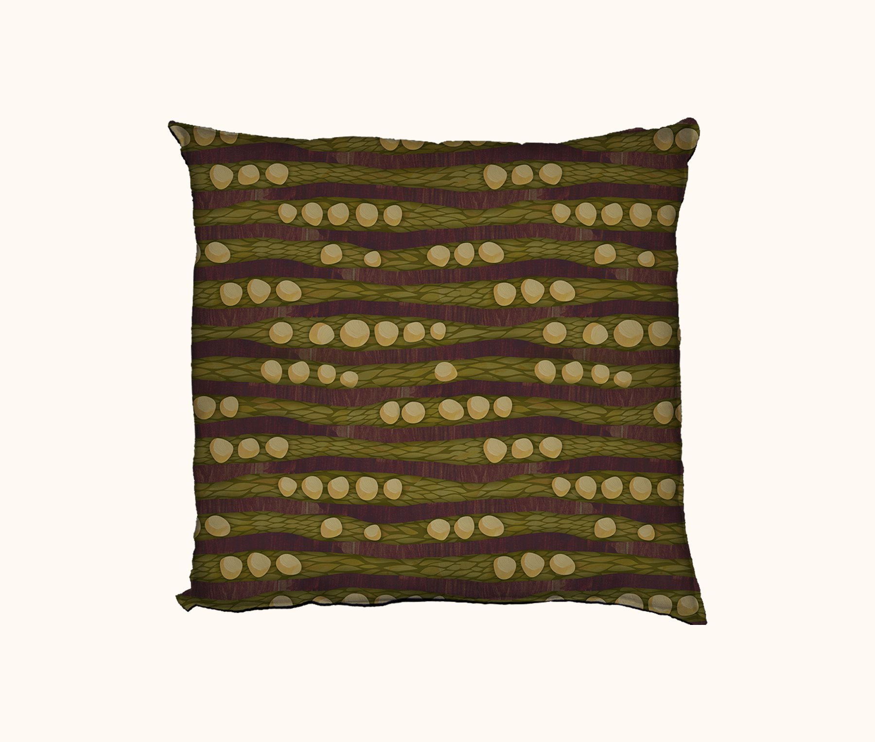a cushion featuring an abstract design based on cycad seeds and trunks against a backdrop of fallen leaves on the woodland floor