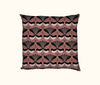 cushion with black, white and grey willie wagtail pattern on a coral background