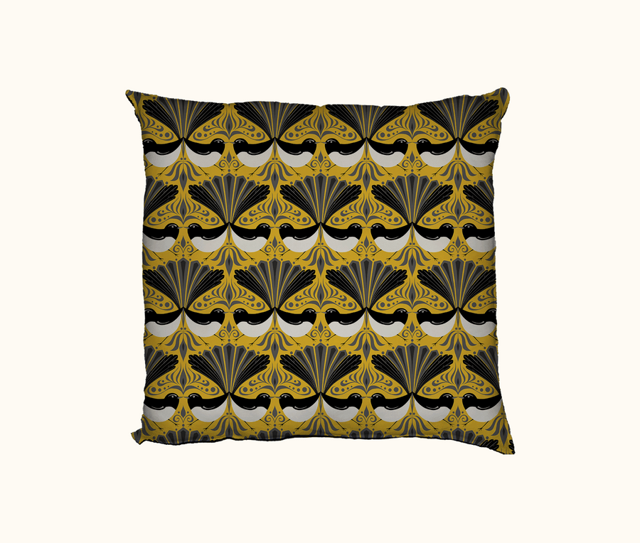 cushion with black, white and grey willie wagtail pattern on a yellow background