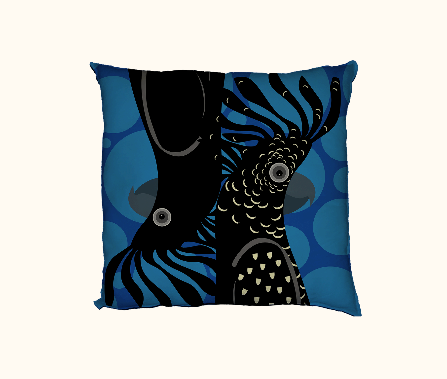 cushion with stylised red-tailed black cockatoo heads on a background of large red spots