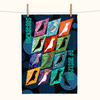 colourful linen tea towel featuring stylised drawings of 12 Australian cockatoos