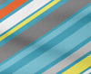 Fabric with multicolored diagonal stripes on a plain background