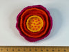 Felt flower brooch with a beaded centre, in yellow, oranges and pink