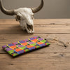 Canvas glasses slip case with bright pop art pattern featuring water buffalo heads in a variety of colours
