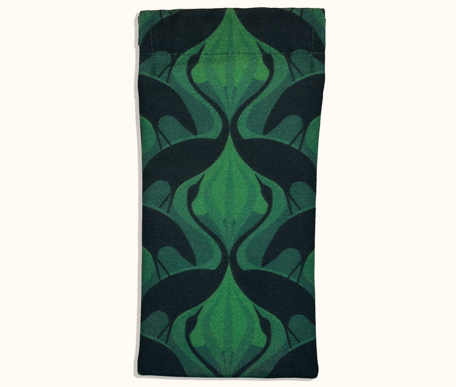 Canvas glasses slip case featuring a silhouette of facing dancing brolgas in an art nouveau inspired pattern in forest green
