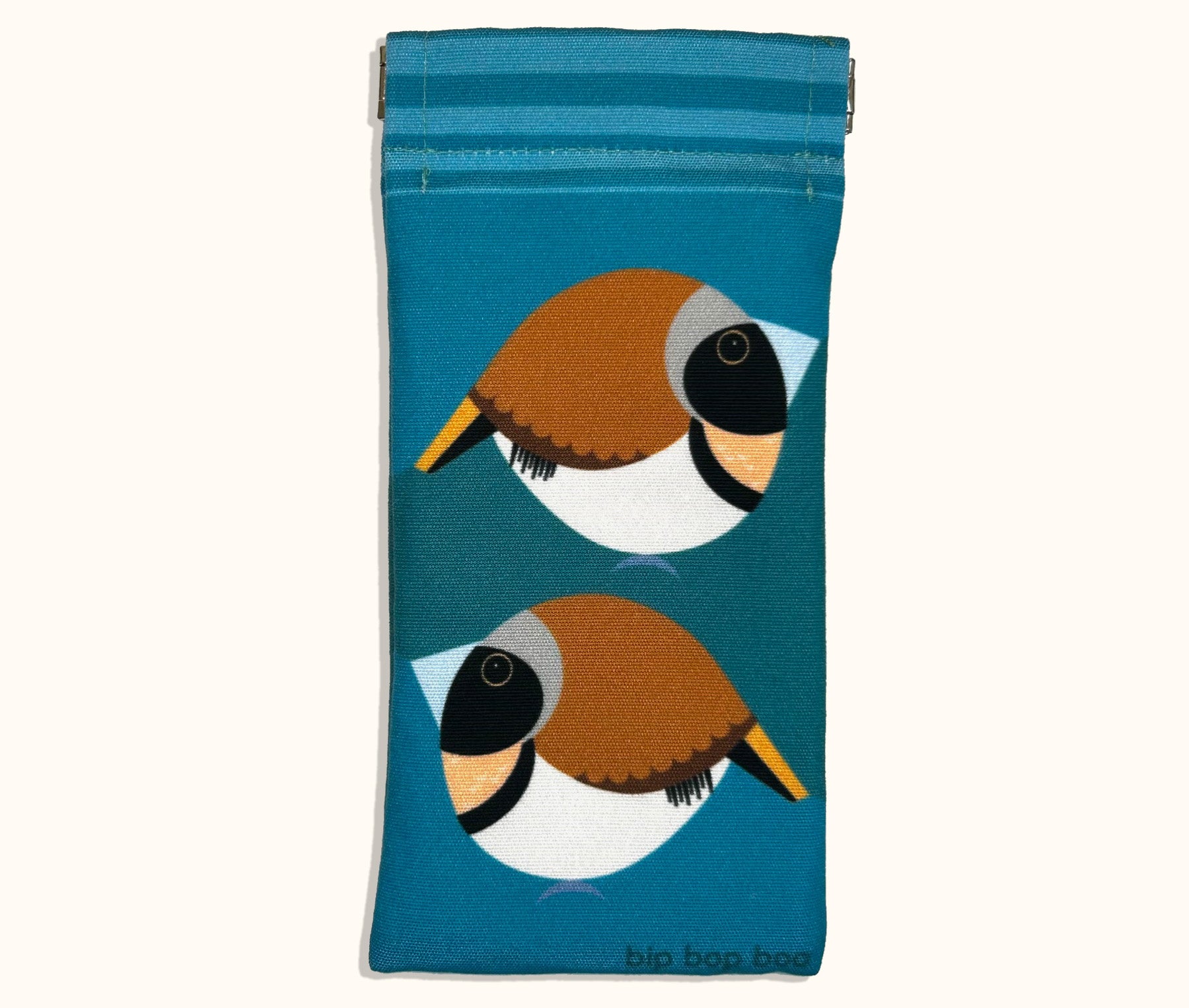 Canvas glasses slip case featuring two very round stylised chestnut breasted mannikins on a blue background