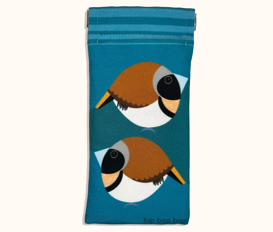 Canvas glasses slip case featuring two very round stylised chestnut breasted mannikins on a blue background