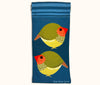 Canvas glasses slip case featuring two very round and highly stylised star finches on a blue background
