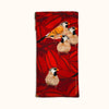 Canvas glasses slip case featuring long tailed finches against a backdrop of red leaves