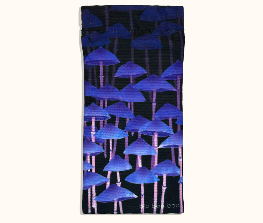 A canvas glasses slip case showing rows of tall purple mushrooms against a black background