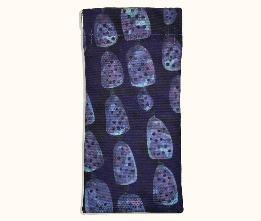 Canvas glasses case featuring a semi abstract design based on bubbleweed in purples and blues