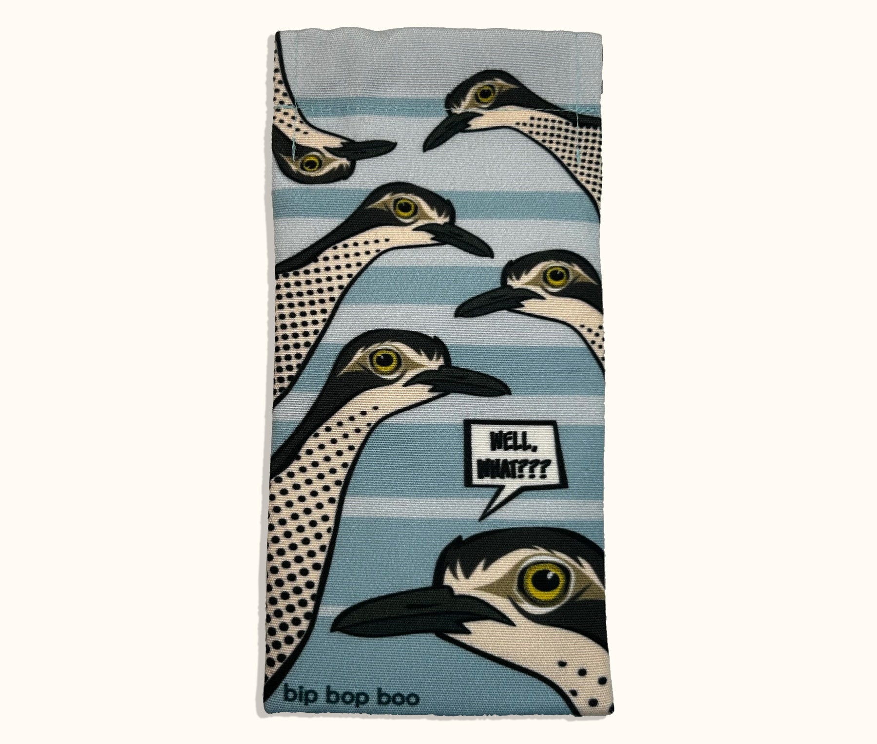 Canvas glasses slip case featuring several pop art bush stone curlews with a speech bubble saying 'Well, what?' against a pale blue striped background.