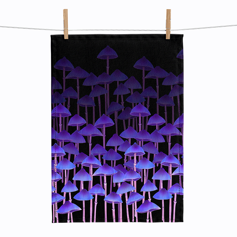 linen tea towel printed with rows of tall purple mushrooms against a black background