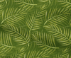 Pattern of green palm leaves on a green background