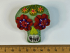 Mint green sugar skull felt brooch with red and purple flower eyes