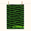 a linen tea towel featuring bright green stylised freshwater crocodiles on a black background