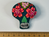 Sugar skull felt brooch with coral and red flower eyes